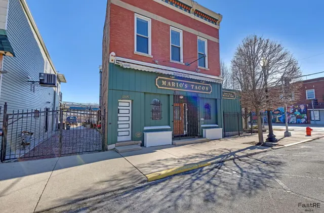 a view of a building with a street