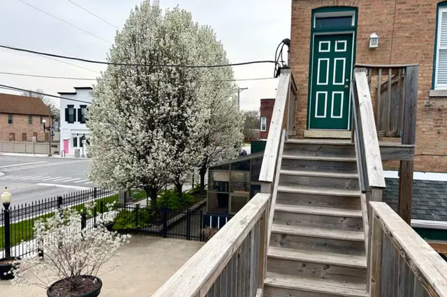 a view of entryway with wooden floor