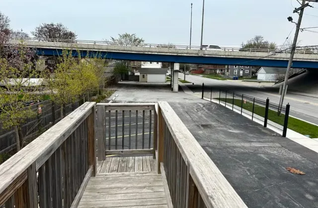 a balcony with view of outdoor space