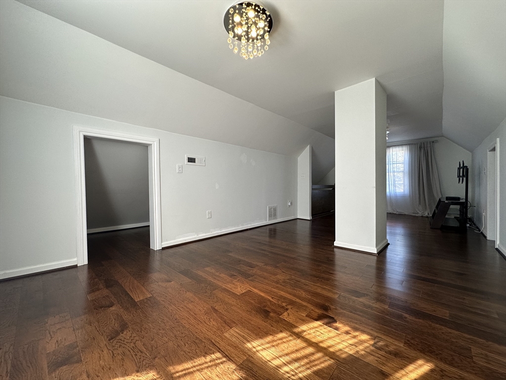 712 Cooper Street Agawam, MA 01001 - Photo 22 of 26 a view of an empty room and glass door