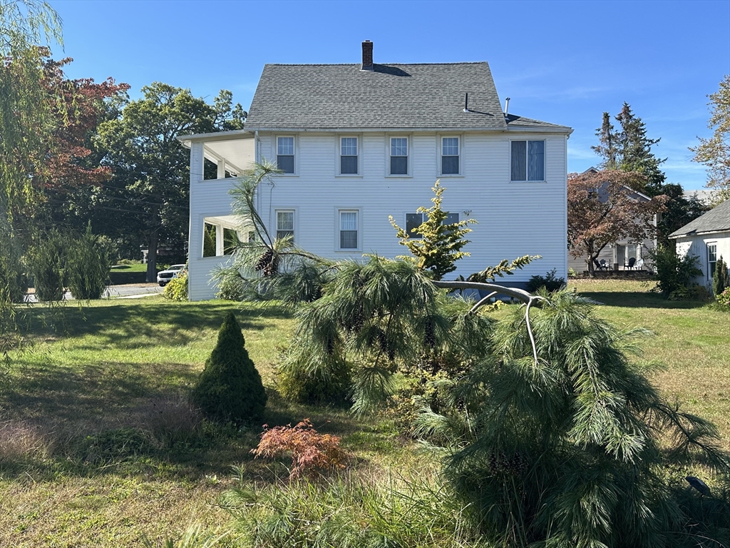 712 Cooper Street Agawam, MA 01001 - Photo 26 of 26 a front view of a house with garden