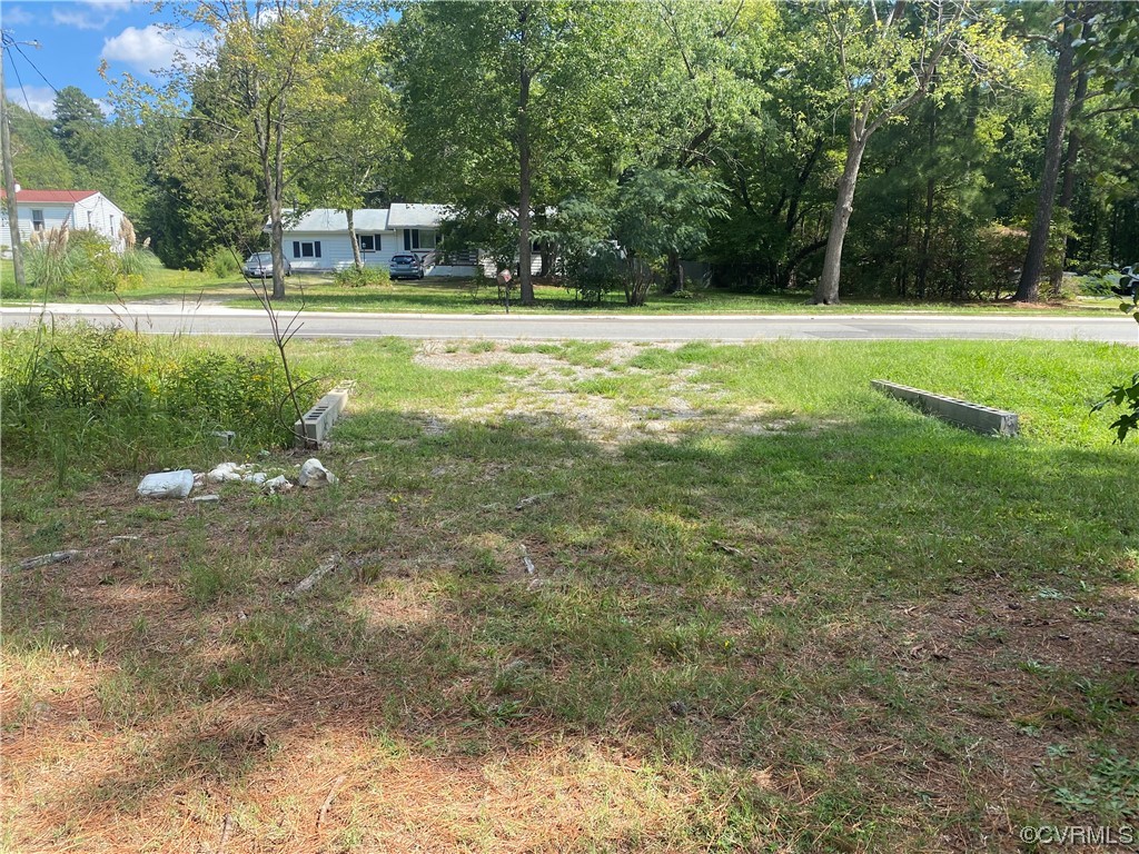 15918 Harrowgate Road Chester, VA 23831 - Photo 8 of 8 a view of a house with a yard