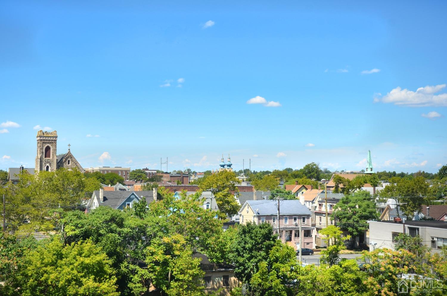 358 Rector Street, Unit 703 Perth Amboy, NJ 08861 - Photo 4 of 25 a view of a city with tall buildings