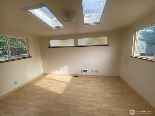 an empty room with windows
