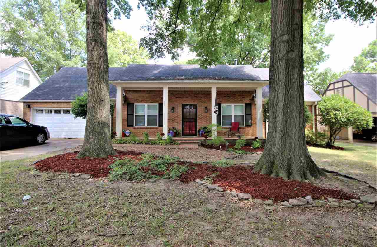 2992 Charles Bryan Road Bartlett, TN 38134 - Photo 1 of 18 a front view of a house with garden