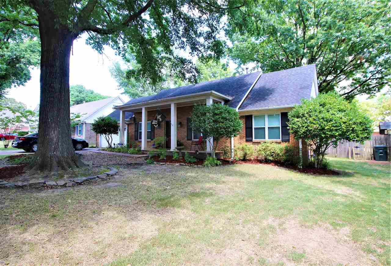 2992 Charles Bryan Road Bartlett, TN 38134 - Photo 2 of 18 a view of a house with a yard and large tree