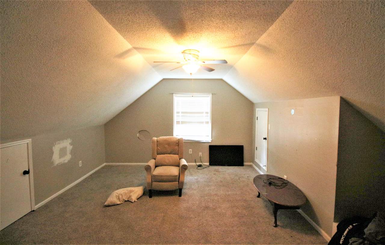 2992 Charles Bryan Road Bartlett, TN 38134 - Photo 14 of 18 a living room with furniture and a window