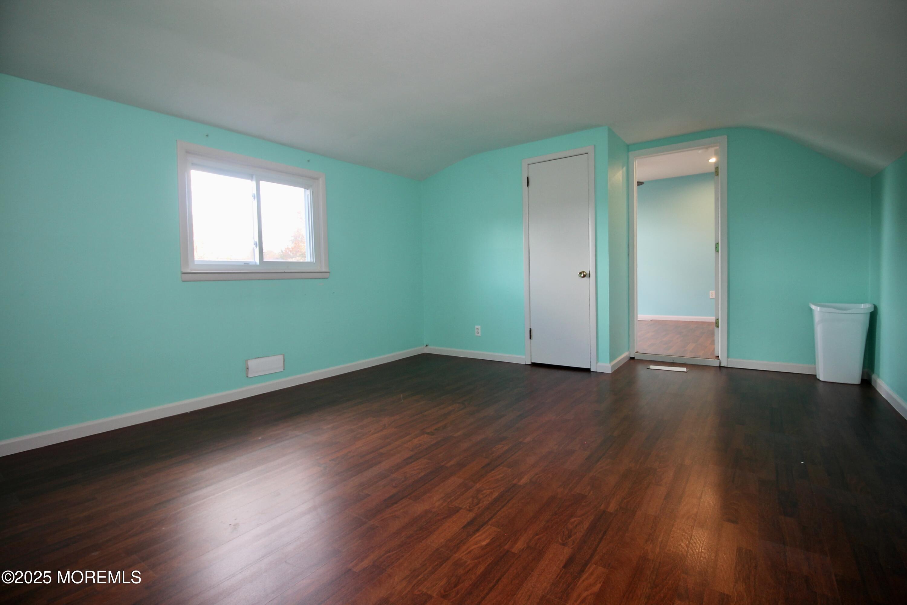 16 Maple Lane Howell, NJ 07731 - Photo 29 of 55 a view of a room with wooden floor and windows