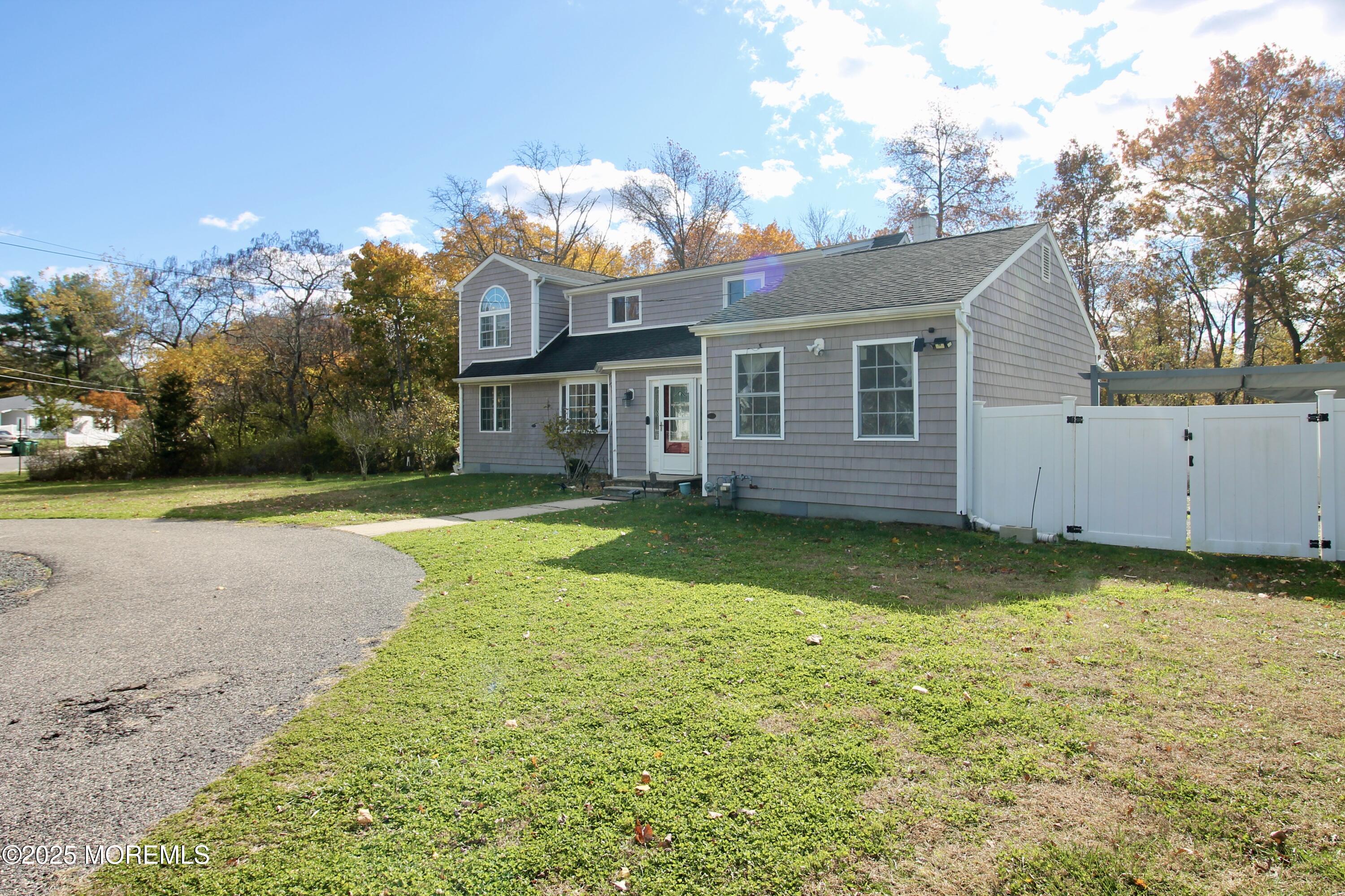16 Maple Lane Howell, NJ 07731 - Photo 3 of 55 a view of a house with a backyard