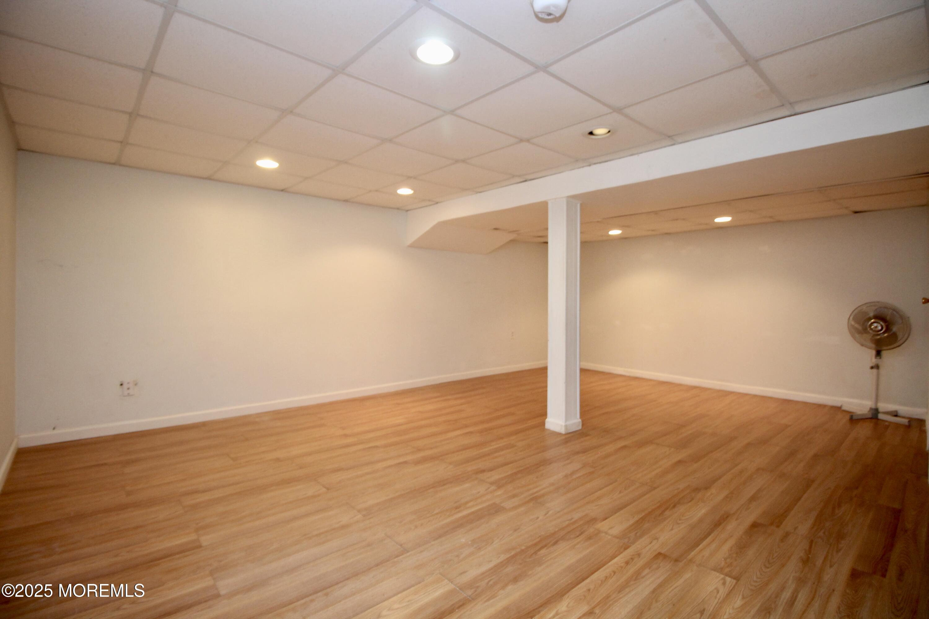 16 Maple Lane Howell, NJ 07731 - Photo 35 of 55 a view of a room with wooden floor