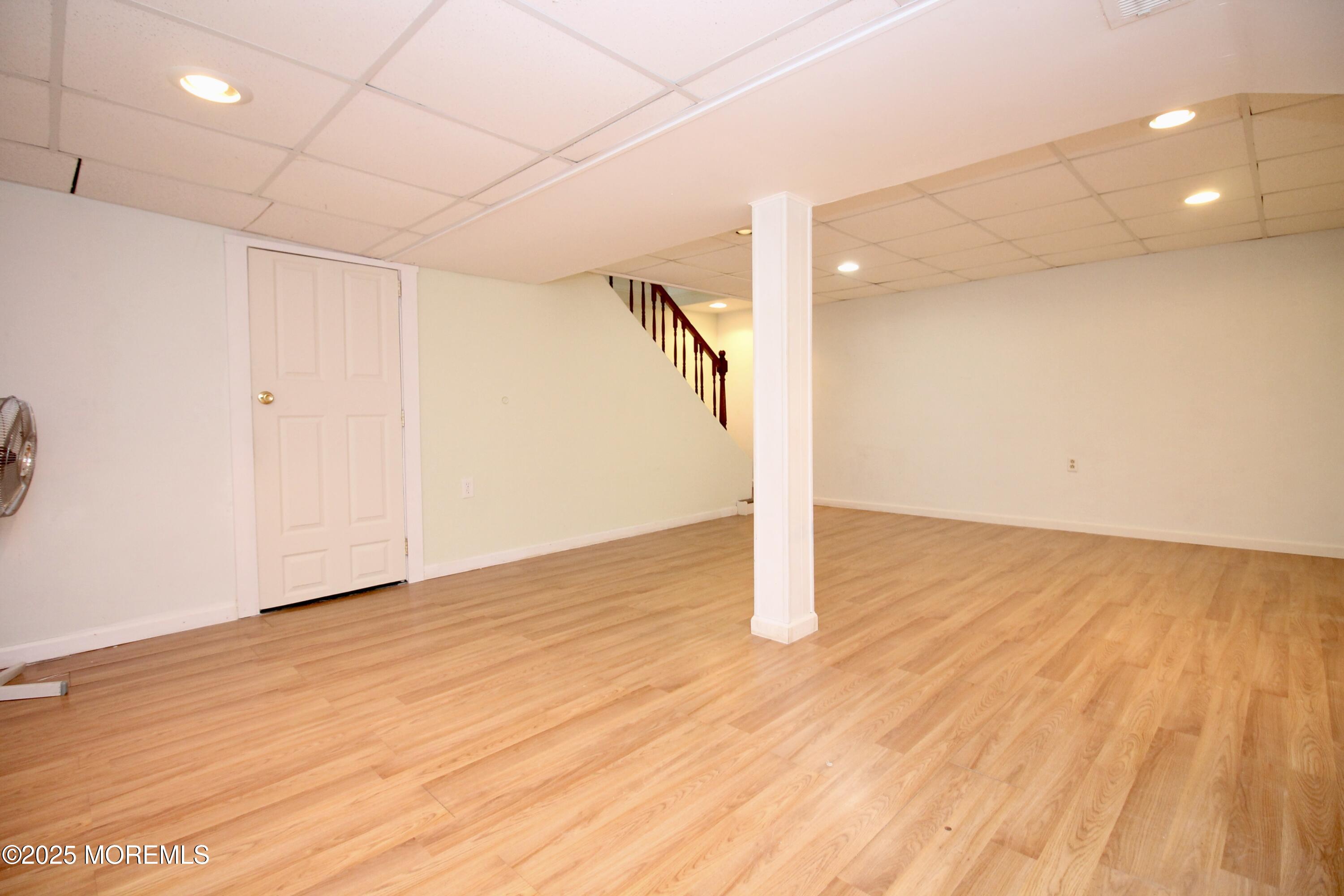 16 Maple Lane Howell, NJ 07731 - Photo 36 of 55 a view of a room with wooden floor