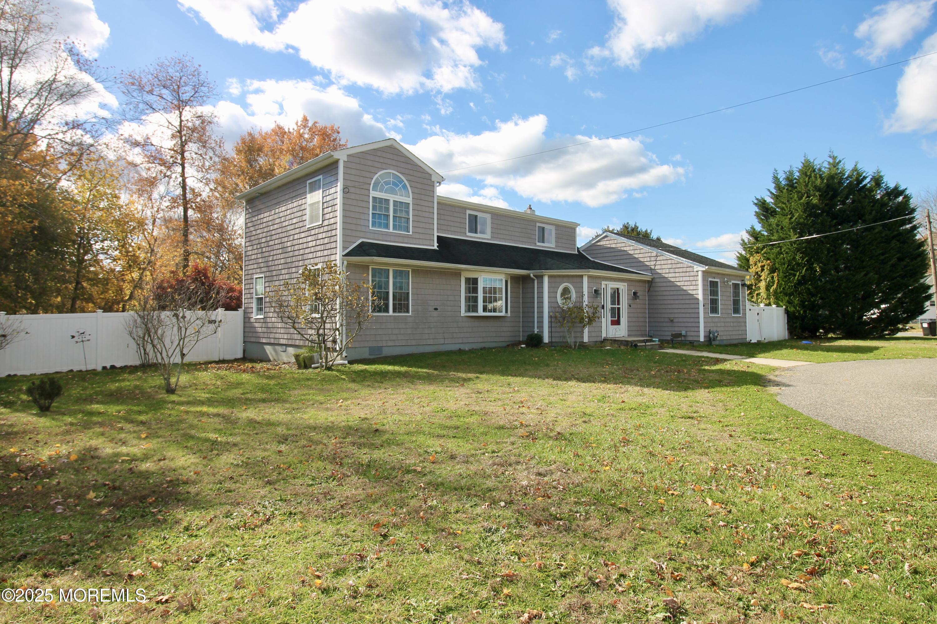 16 Maple Lane Howell, NJ 07731 - Photo 4 of 55 a view of a house with a backyard