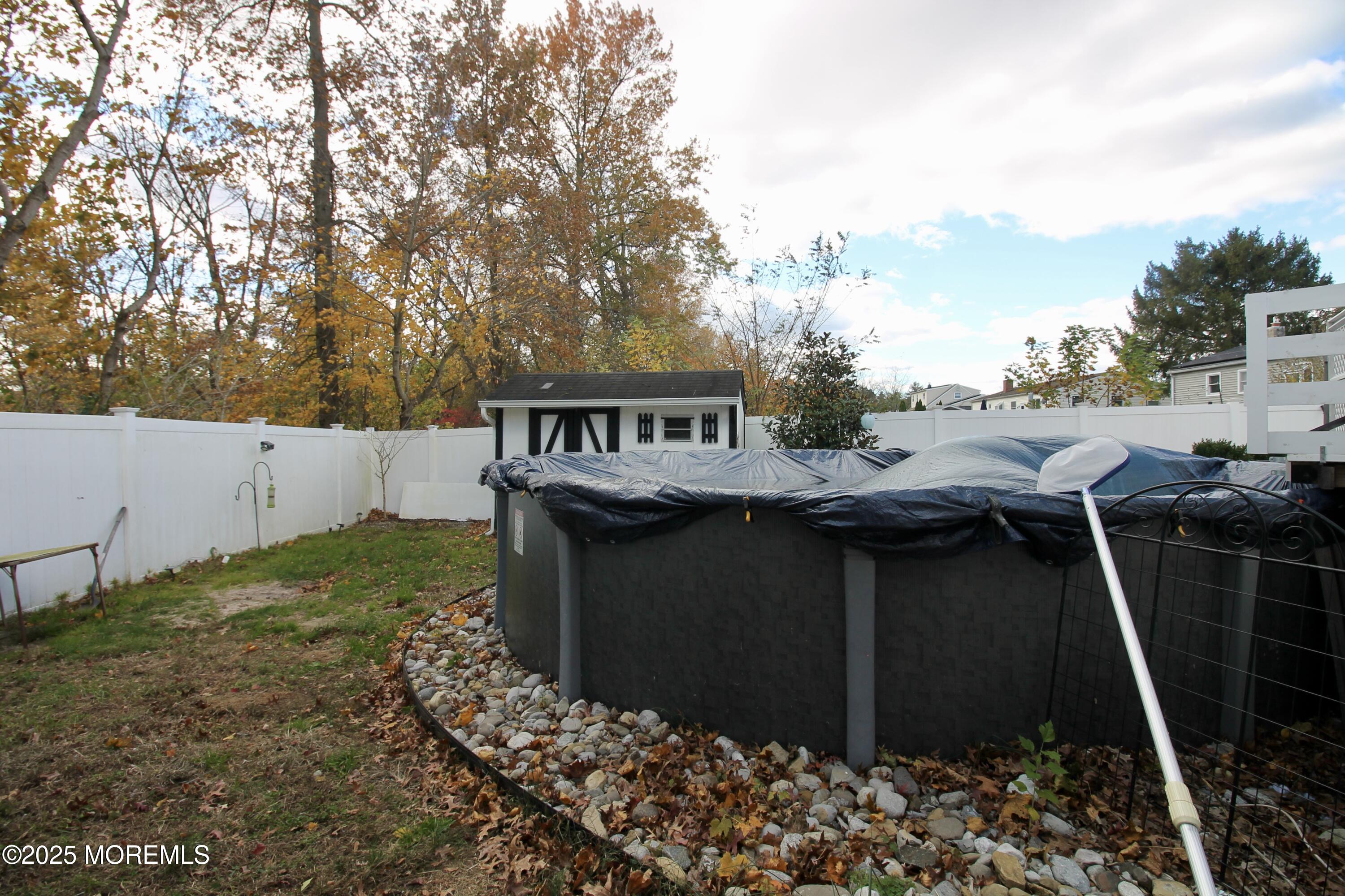 16 Maple Lane Howell, NJ 07731 - Photo 45 of 55 a view of a house with backyard and sitting area