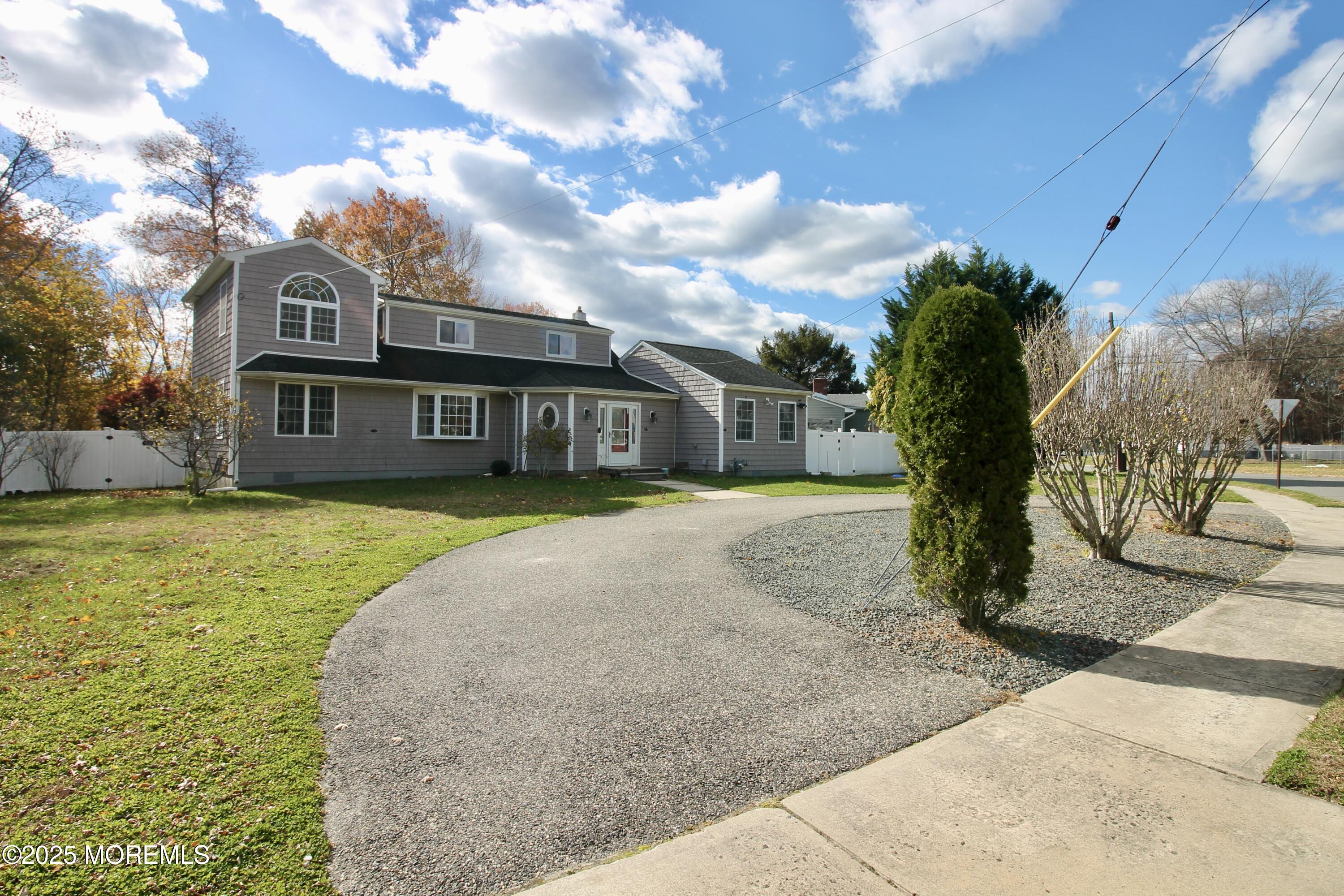 16 Maple Lane Howell, NJ 07731 - Photo 5 of 55 a view of a house with a yard