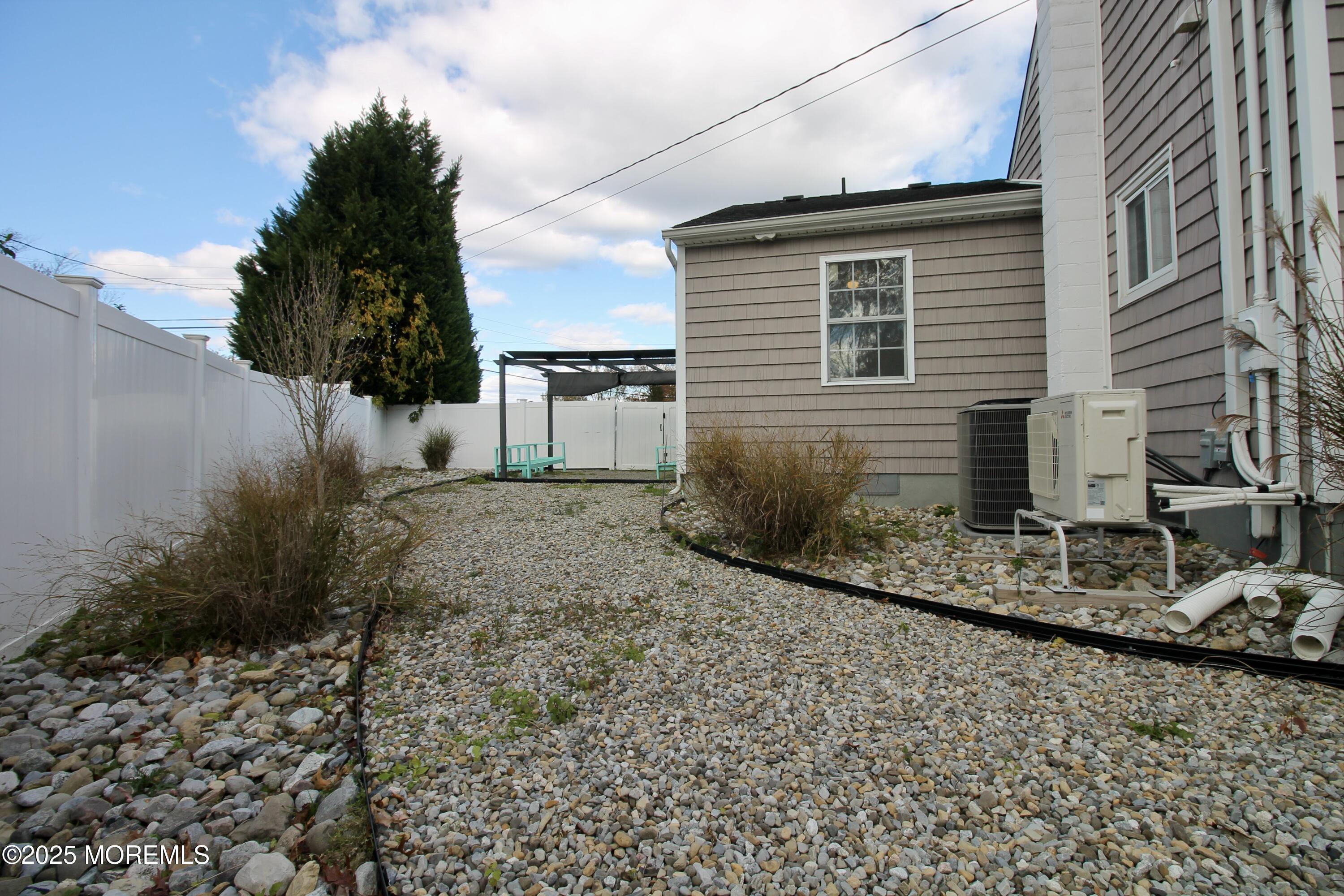 16 Maple Lane Howell, NJ 07731 - Photo 51 of 55 a view of a house with a yard