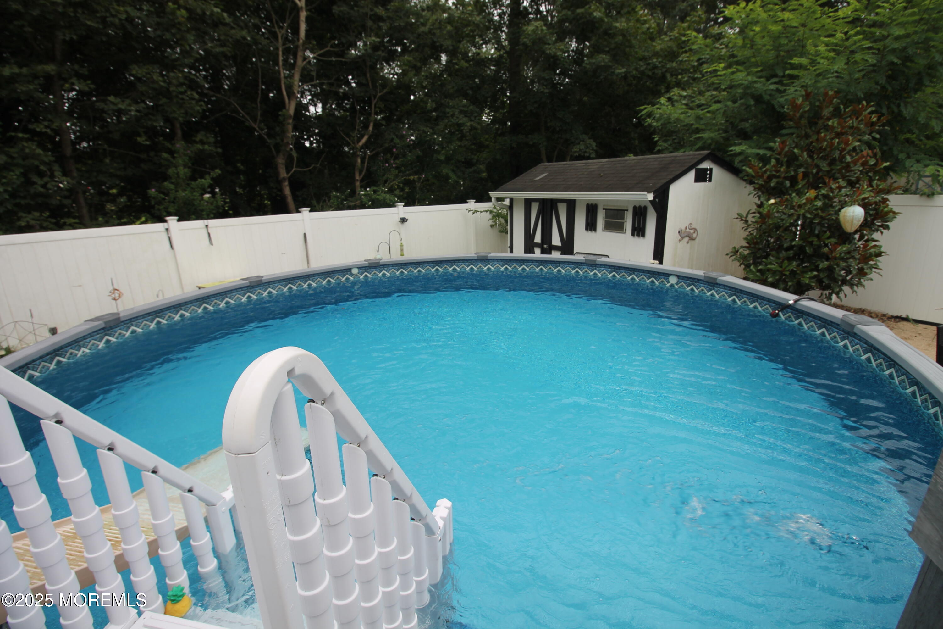 16 Maple Lane Howell, NJ 07731 - Photo 54 of 55 a view of a house with a backyard