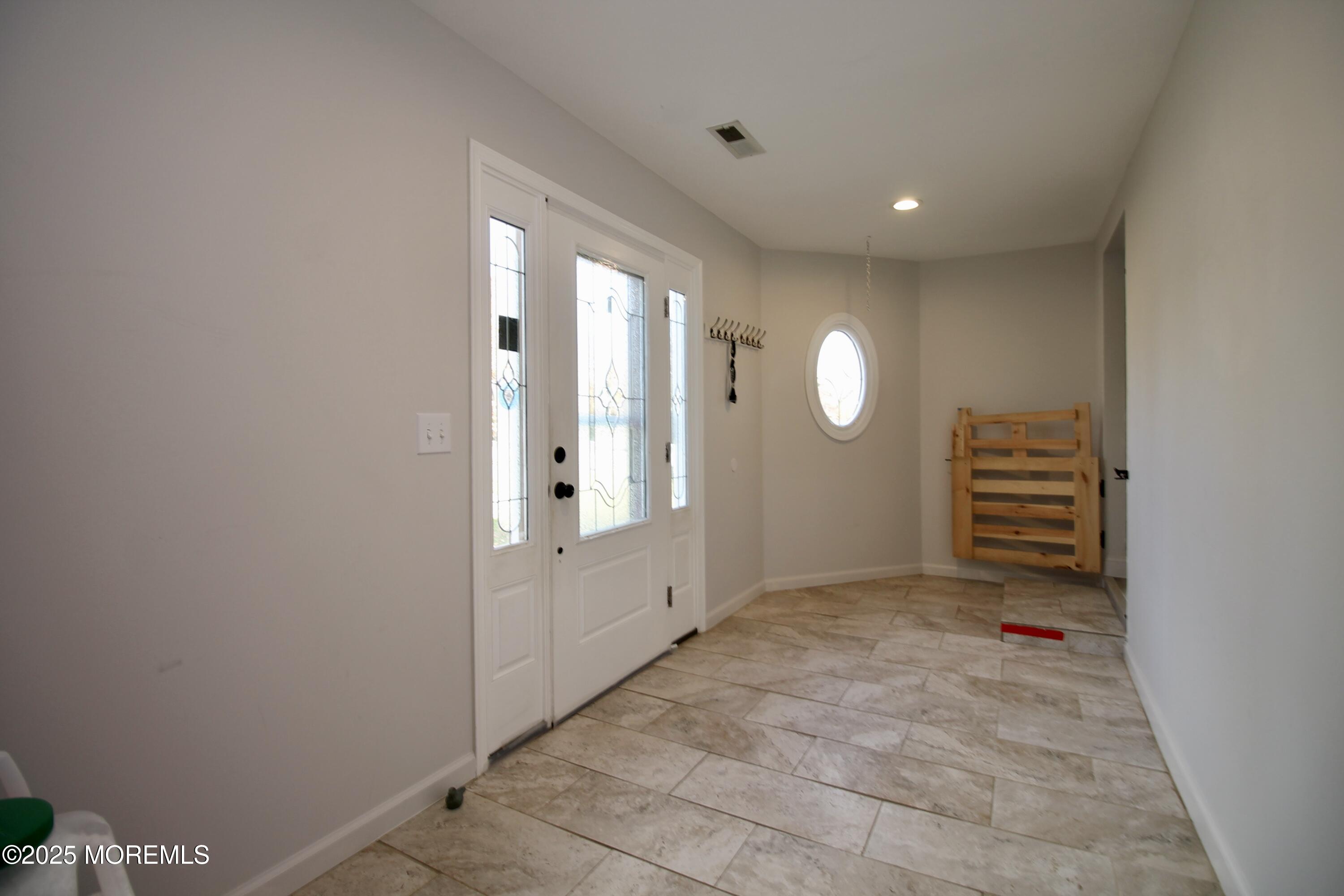 16 Maple Lane Howell, NJ 07731 - Photo 8 of 55 a view of an empty room with a bathroom