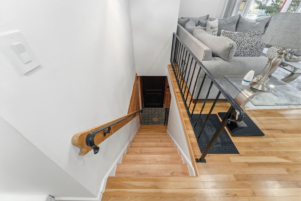 26 Wakefield Avenue Webster, MA 01570 - Photo 23 of 42 a stair with table and chairs