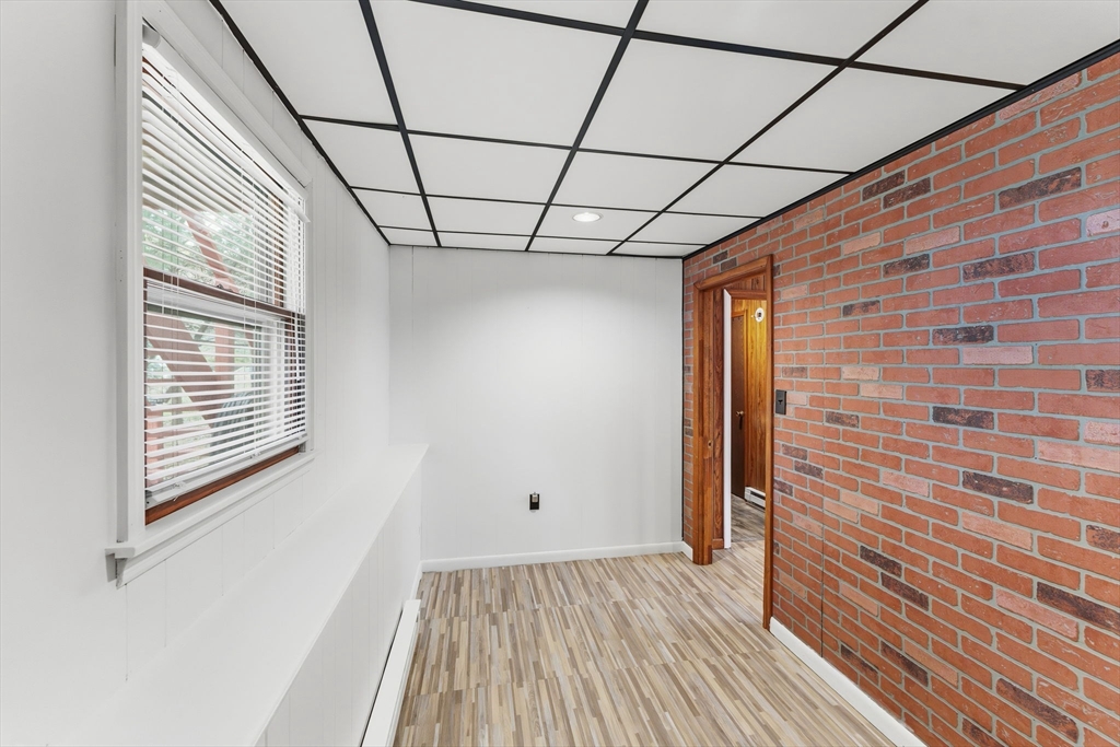 26 Wakefield Avenue Webster, MA 01570 - Photo 30 of 42 a view of empty room with wooden floor and fan