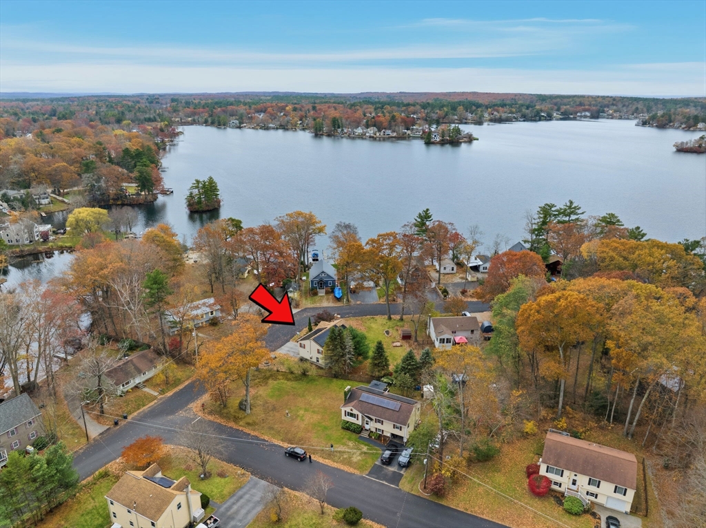 26 Wakefield Avenue Webster, MA 01570 - Photo 39 of 42 an aerial view of city and lake with boats and trees all around