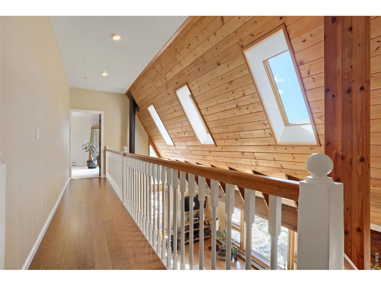 6010 Flagstaff Road Boulder, CO 80302 - Photo 24 of 41 Open bridge to Primary Bedroom. More windows bring in even more light to below.