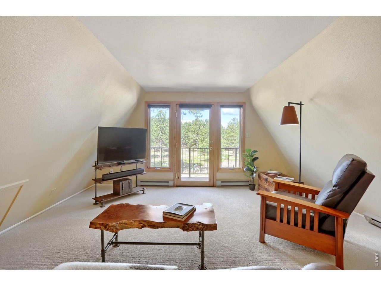 6010 Flagstaff Road Boulder, CO 80302 - Photo 30 of 41 Upper level family room/office/ or quiet space leads out to exterior porch and deck