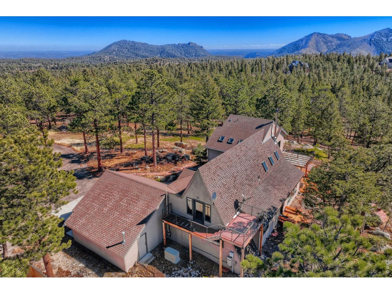 6010 Flagstaff Road Boulder, CO 80302 - Photo 35 of 41 Note the back of Flatirons to see how close this home is to Boulder