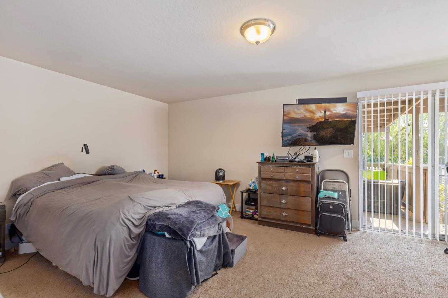 4563 Malabar Avenue Castro Valley, CA 94546 - Photo 13 of 19 a bedroom with a bed and a flat tv screen