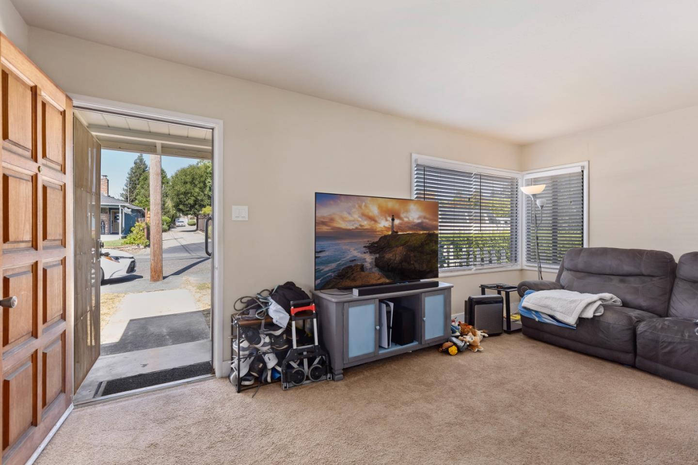 4563 Malabar Avenue Castro Valley, CA 94546 - Photo 3 of 19 a room with furniture and a flat screen tv