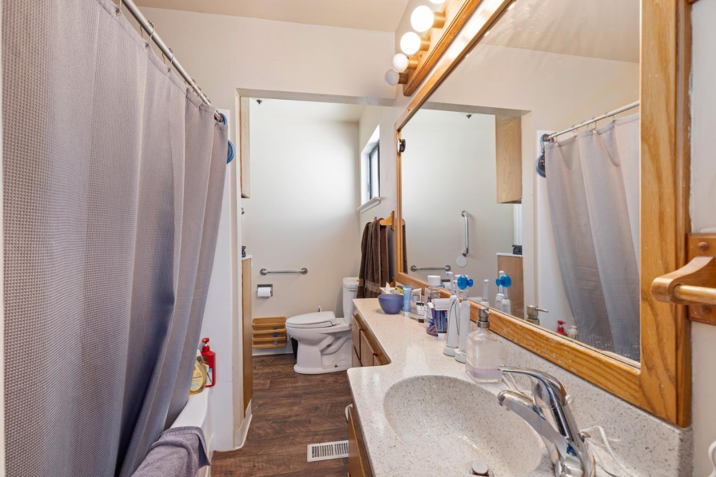 4563 Malabar Avenue Castro Valley, CA 94546 - Photo 10 of 19 a bathroom with a sink toilet and shower