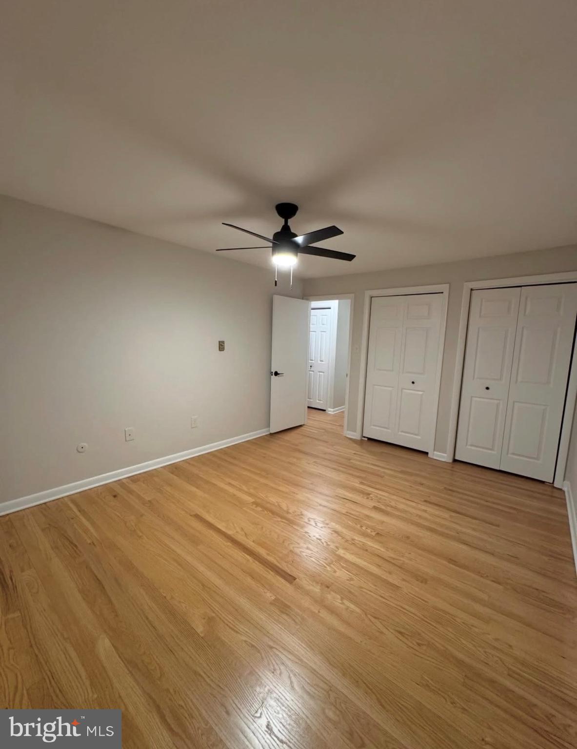 4 D Sterling Terrace, Unit D Stratford, NJ 08084 - Photo 6 of 8 wooden floor in an empty room