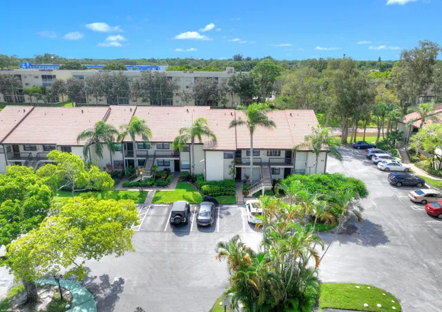 a view of a patio next to a yard