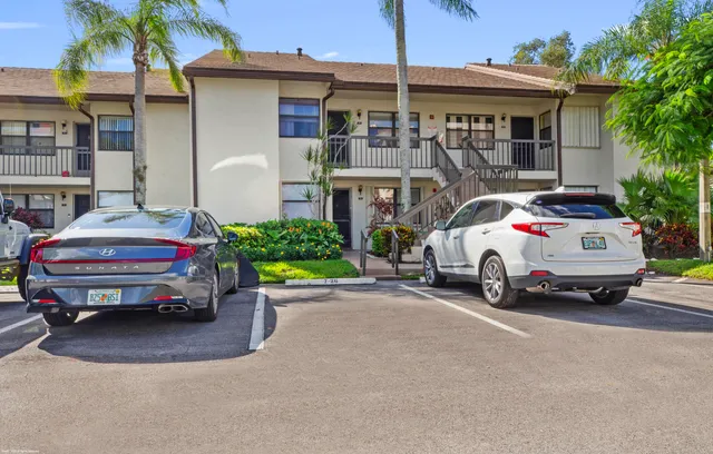 a car parked in front of a house