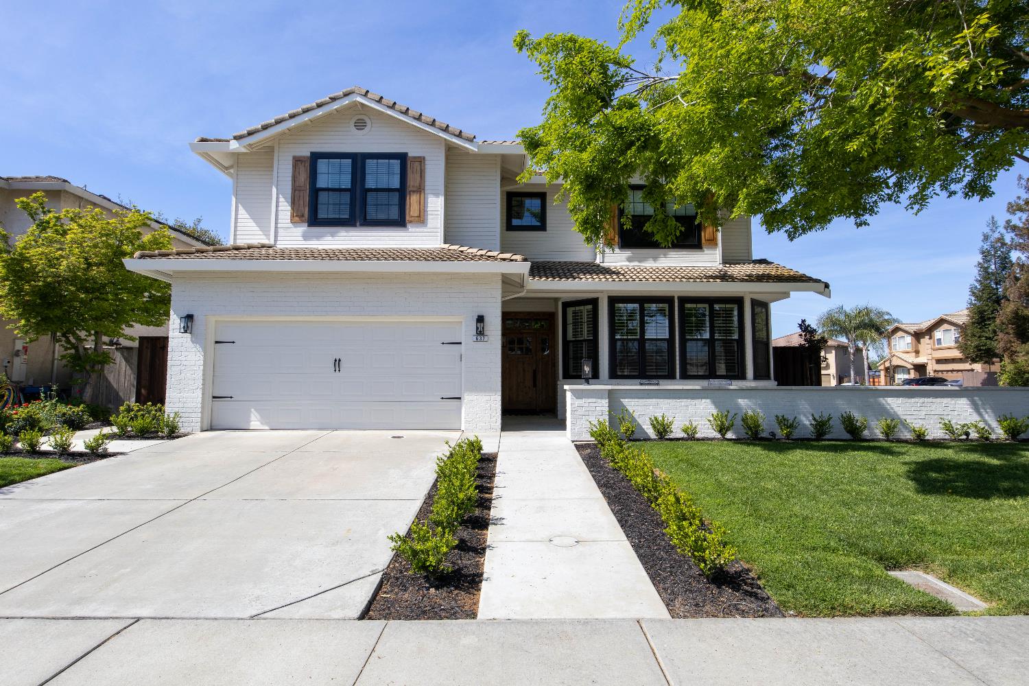 637 Rebekah Court Ripon, CA 95366 - Photo 7 of 69 a front view of a house with a yard