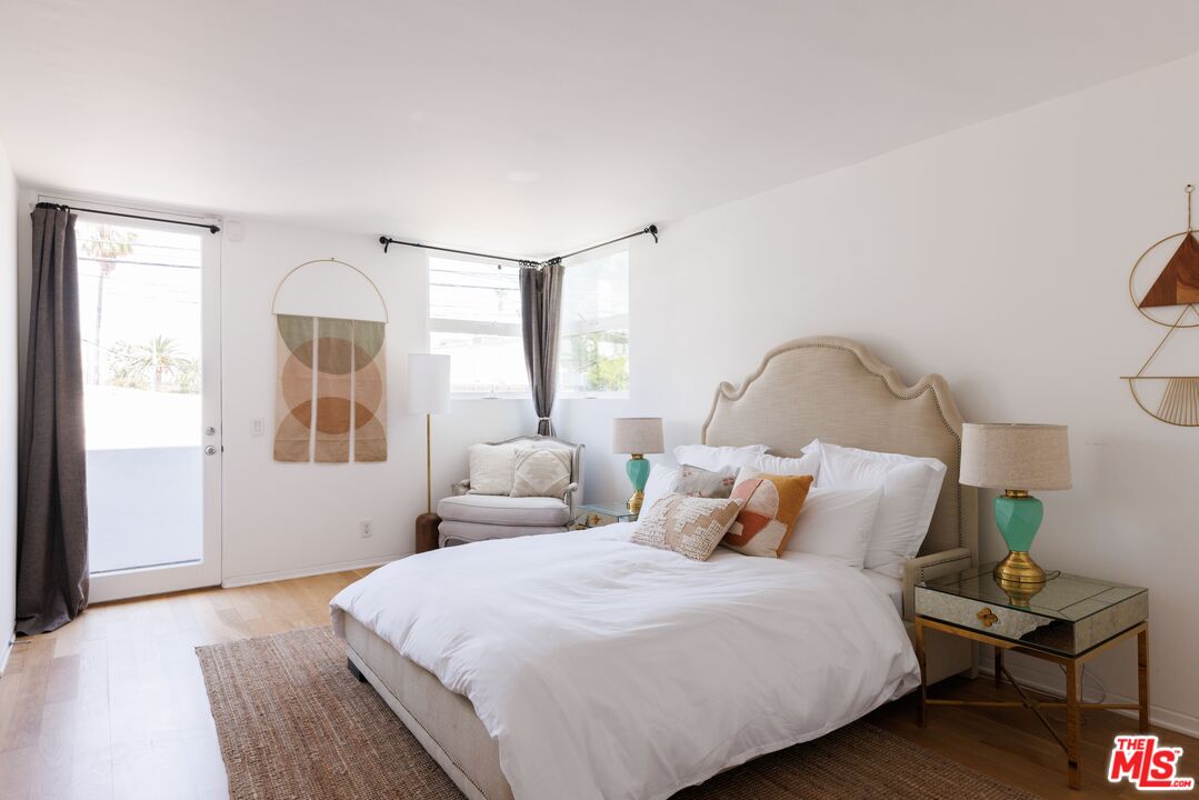 1523 Cabrillo Avenue Venice, CA 90291 - Photo 13 of 22 a bedroom with bed and window