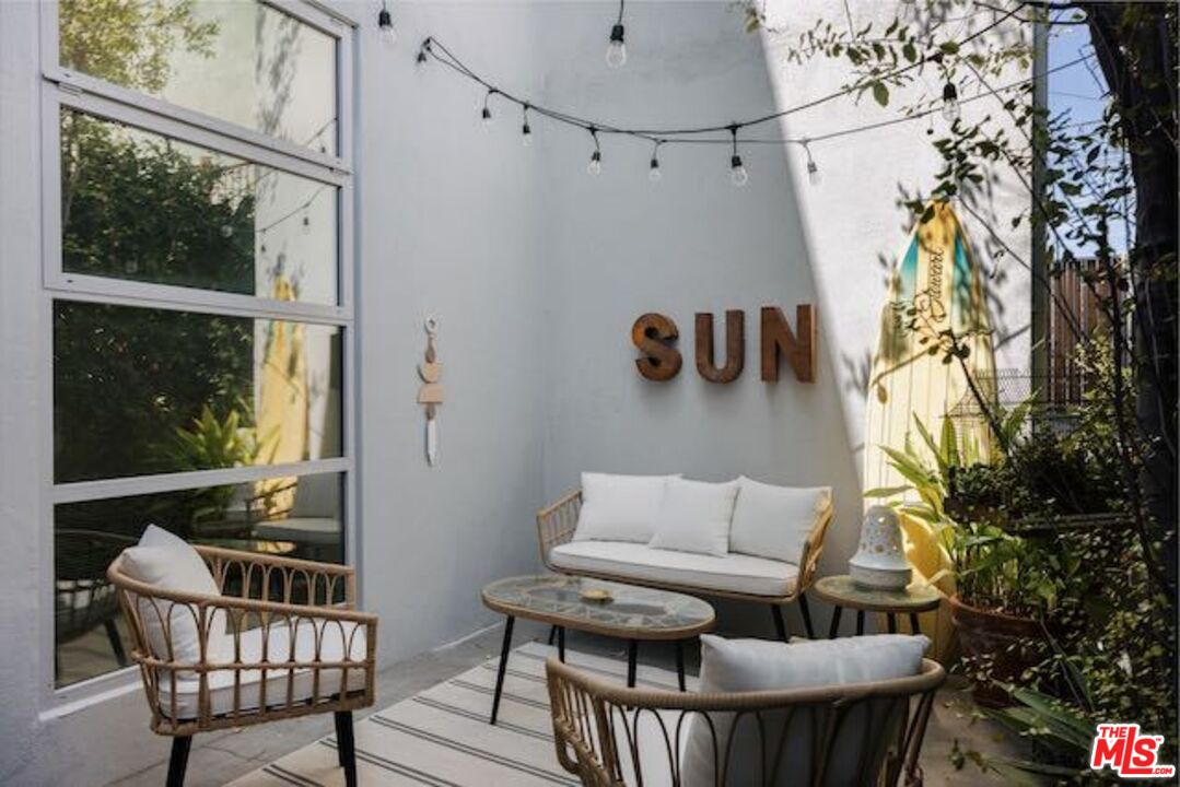 1523 Cabrillo Avenue Venice, CA 90291 - Photo 16 of 22 a balcony view with a couch and table chair