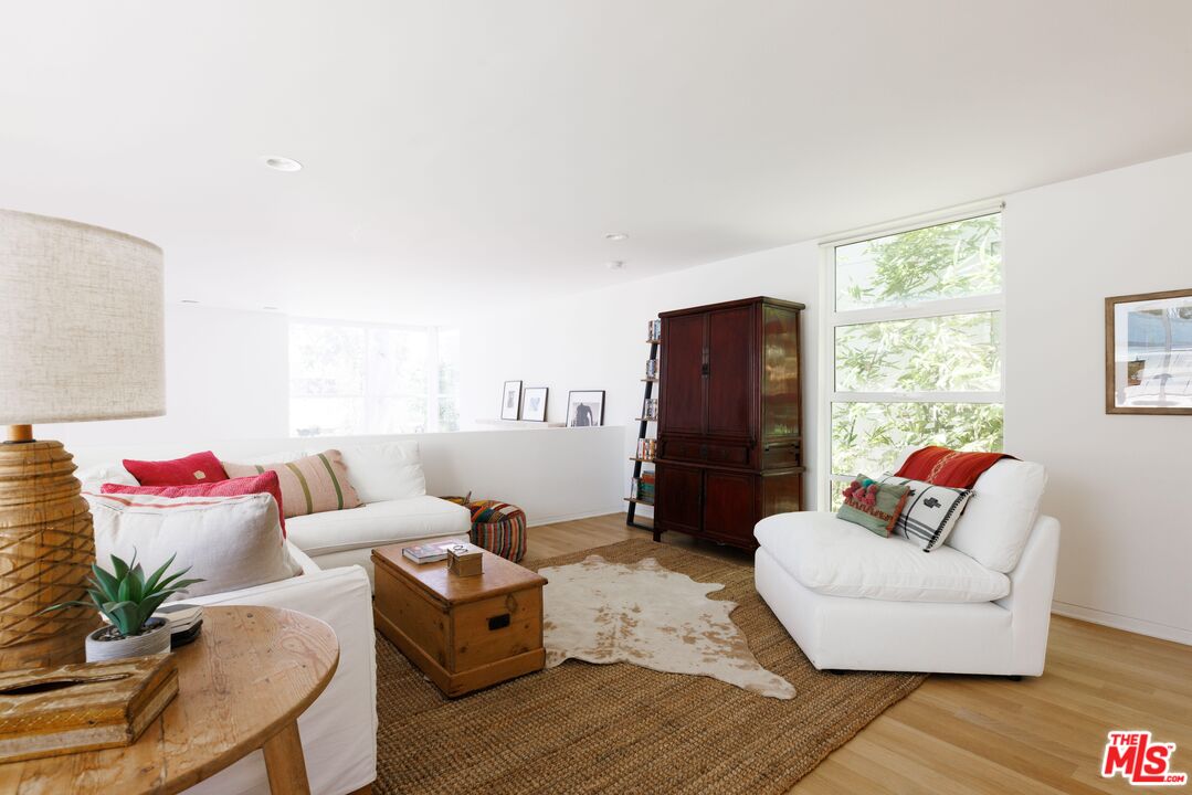 1523 Cabrillo Avenue Venice, CA 90291 - Photo 8 of 22 a living room with furniture and a flat screen tv