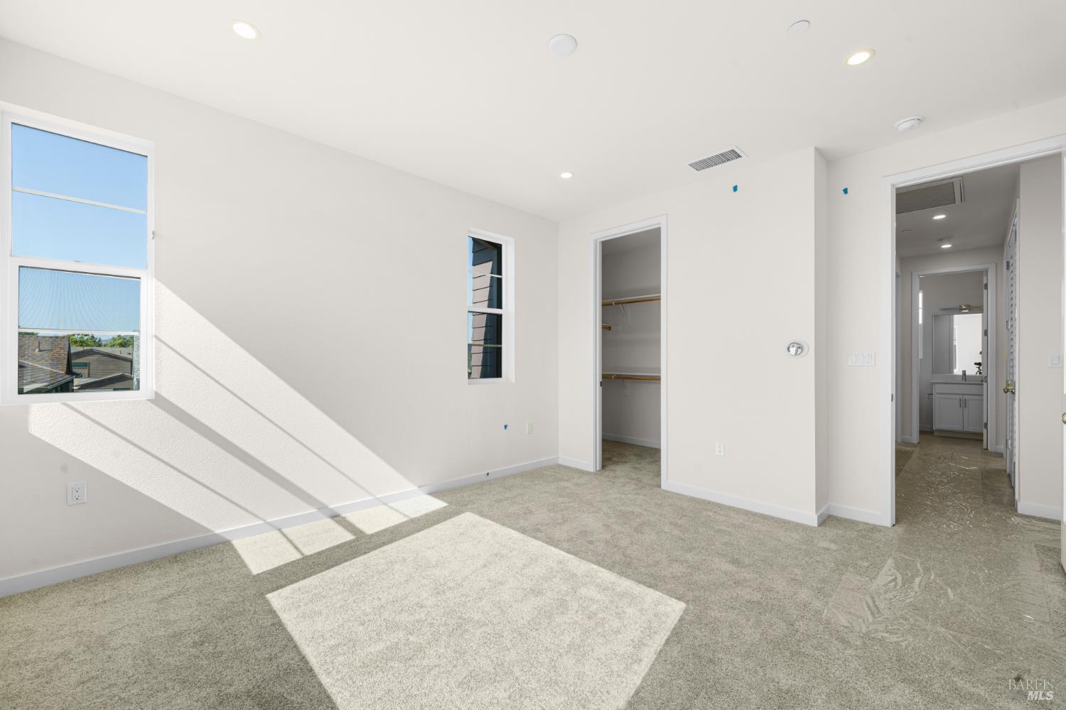 1448 Waterside Lane Rohnert Park, CA 94928 - Photo 18 of 35 an empty room with windows and entrance to other room