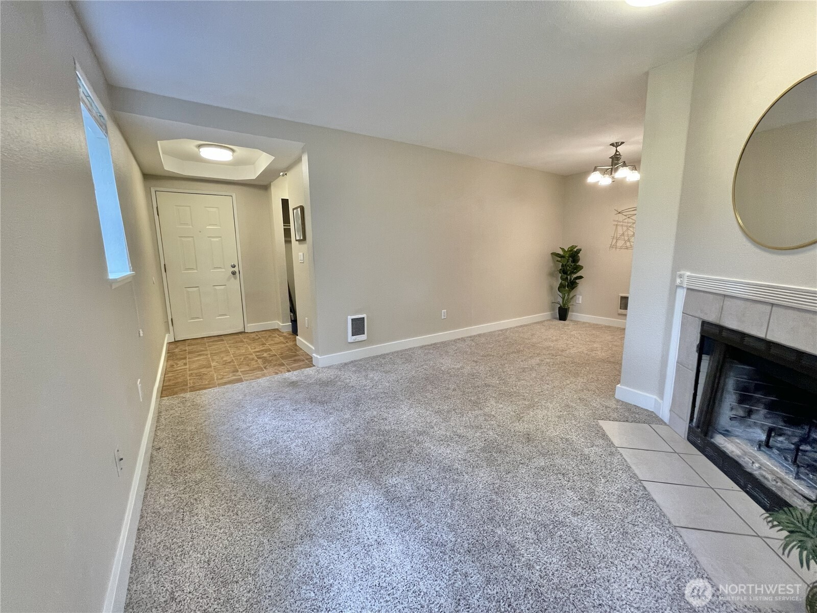5300 Harbour Pointe Boulevard, Unit 311H Mukilteo, WA 98275 - Photo 11 of 27 a view of a livingroom with a fireplace