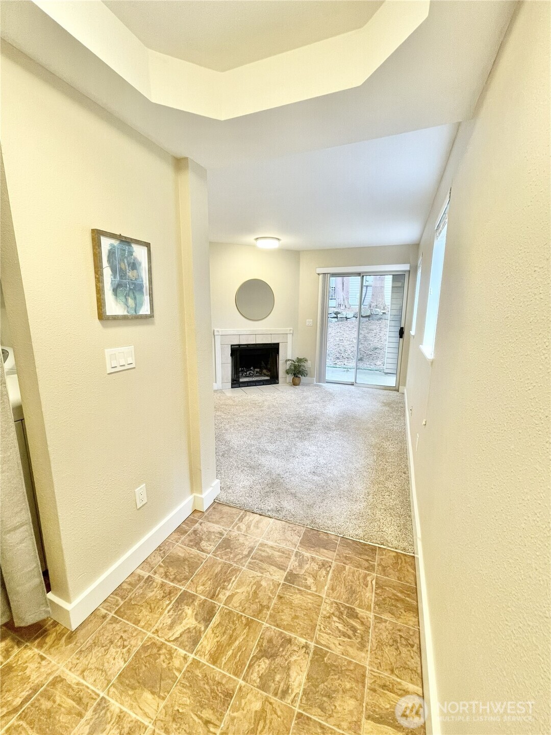 5300 Harbour Pointe Boulevard, Unit 311H Mukilteo, WA 98275 - Photo 13 of 27 a view of a livingroom with wooden floor and a bathroom