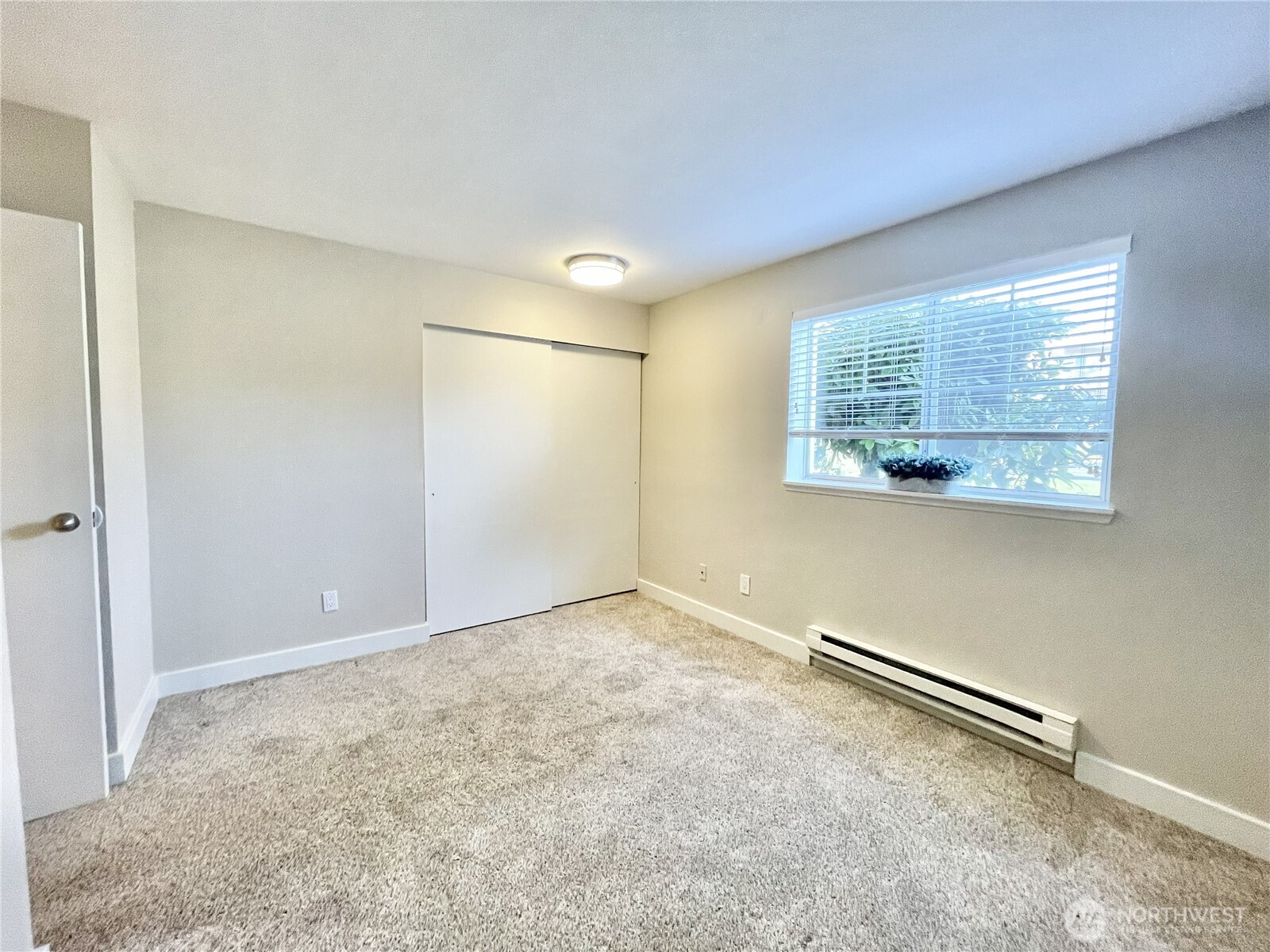 5300 Harbour Pointe Boulevard, Unit 311H Mukilteo, WA 98275 - Photo 16 of 27 an empty room with windows