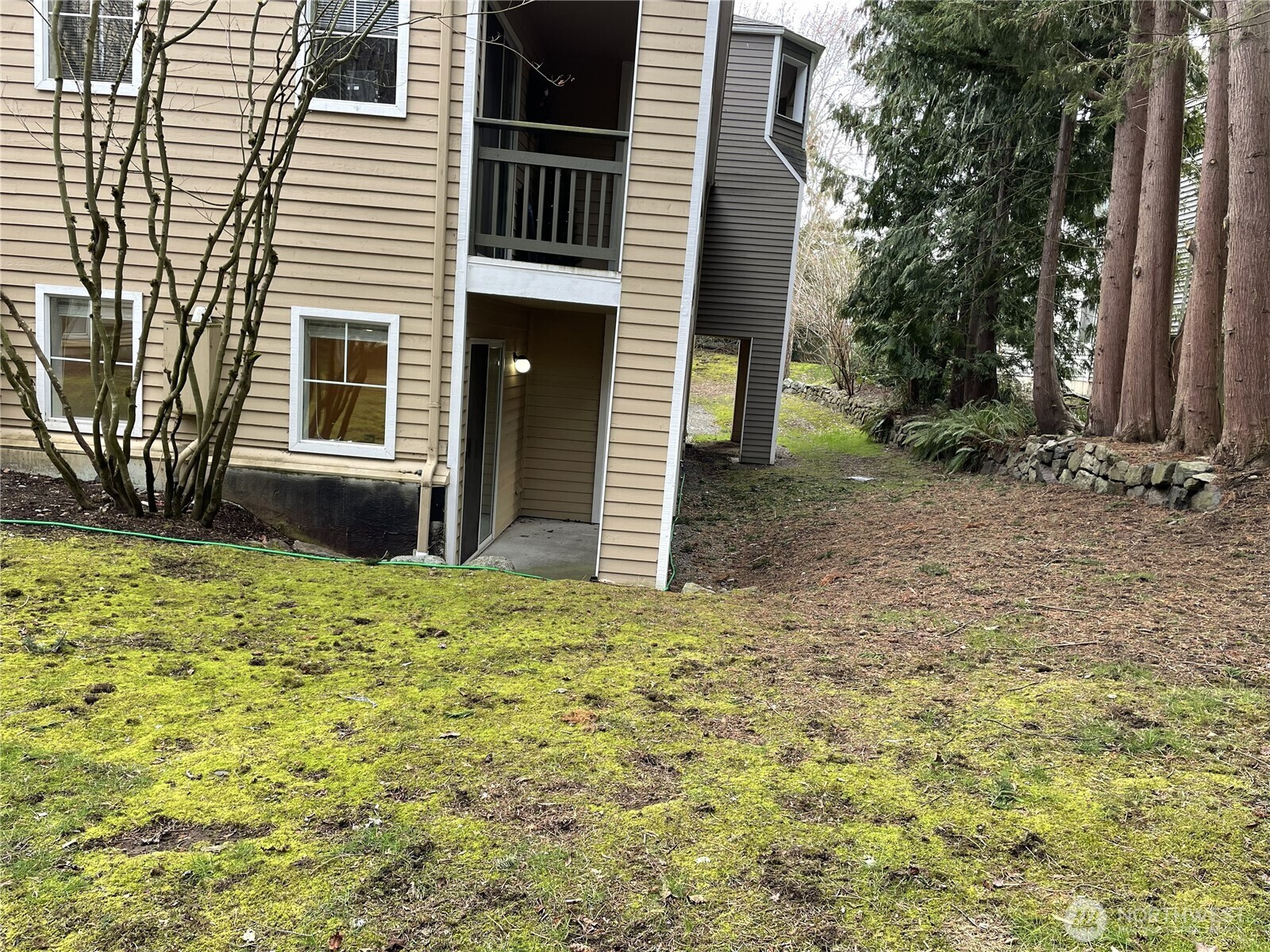 5300 Harbour Pointe Boulevard, Unit 311H Mukilteo, WA 98275 - Photo 25 of 27 a view of a house with a yard