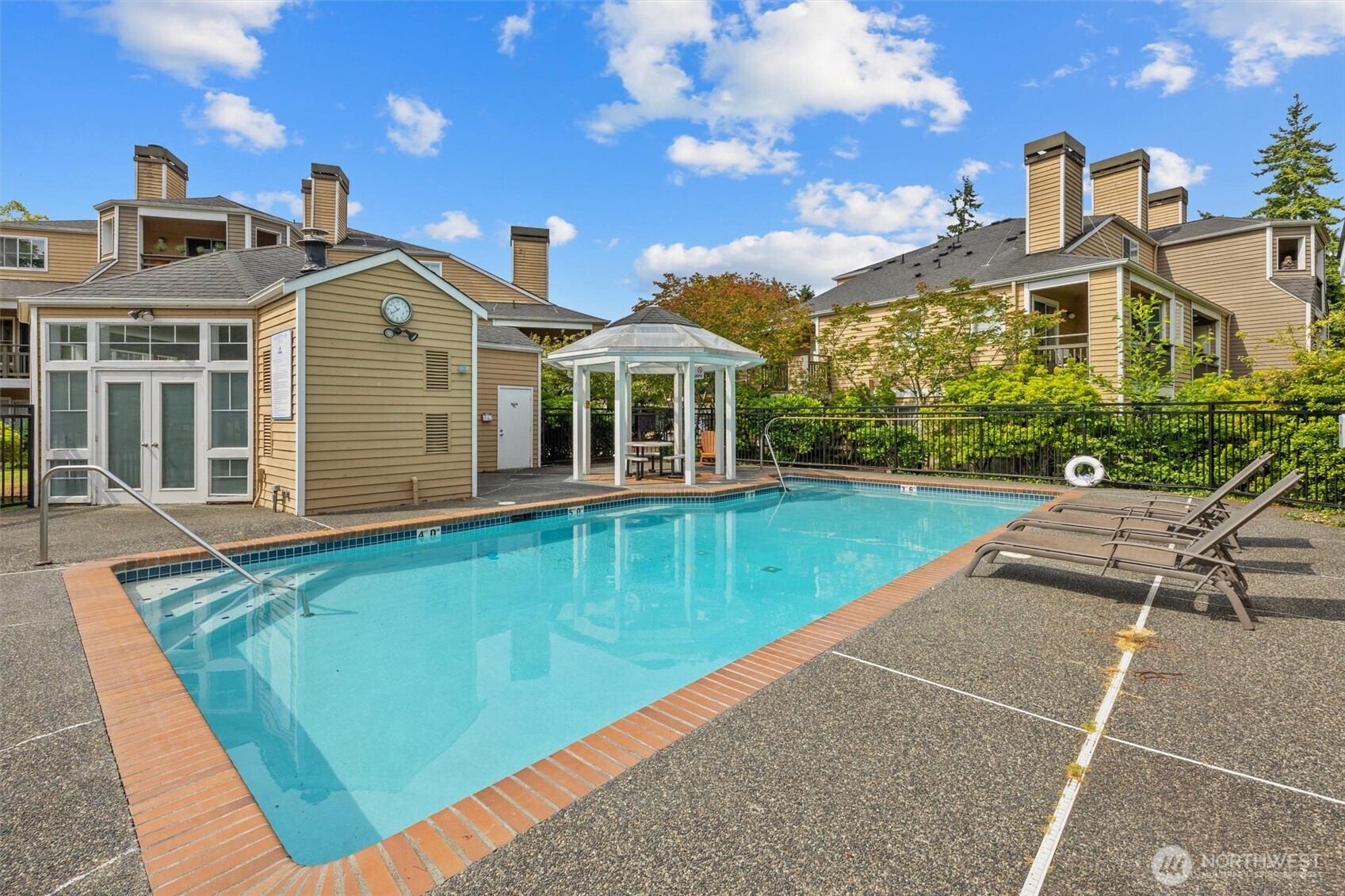 5300 Harbour Pointe Boulevard, Unit 311H Mukilteo, WA 98275 - Photo 26 of 27 a view of a house with a yard