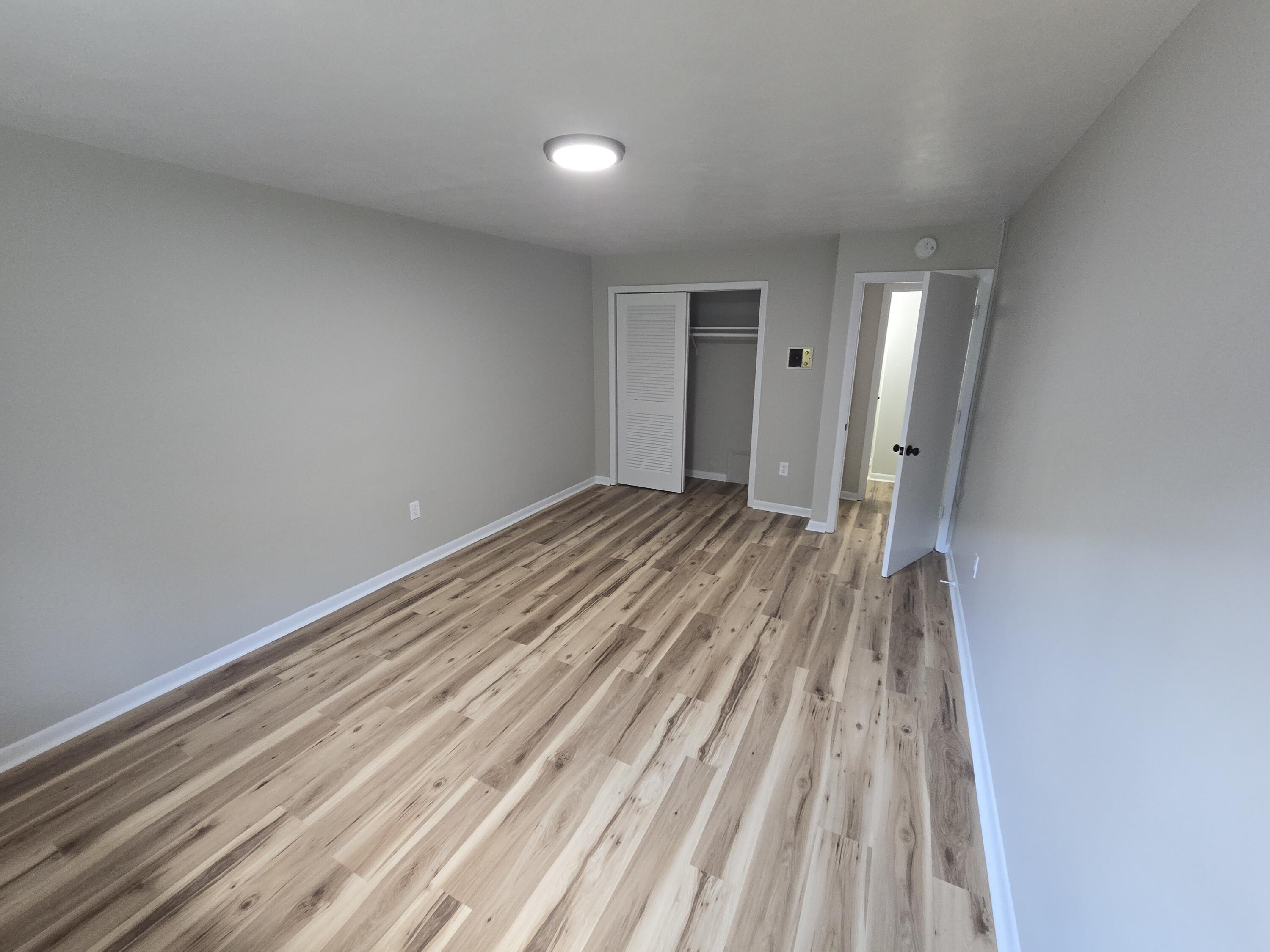 2607 Westover Avenue Southwest, Unit 106 Roanoke, VA 24015 - Photo 2 of 7 a view of a room with wooden floor