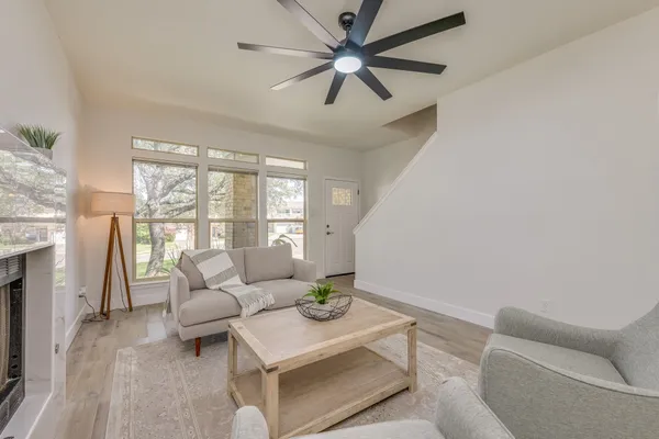 a living room with furniture and a window