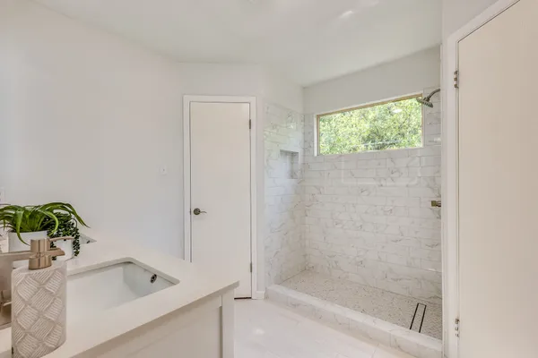 a bathroom with a bathtub