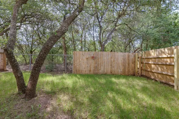 a view of backyard with green space