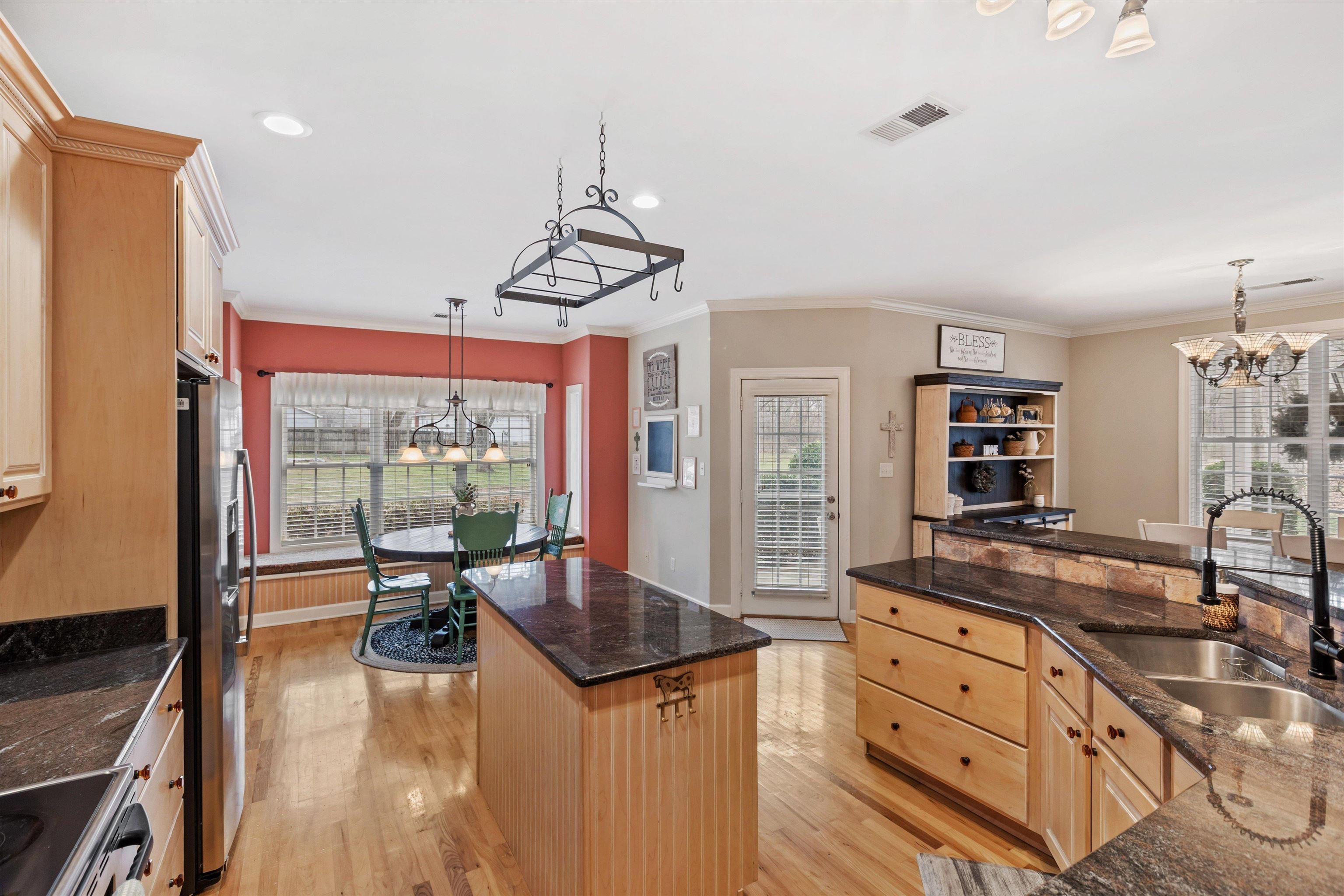 2789 North Collierville Arlington Road Eads, TN 38028 - Photo 12 of 34 a view of a center kitchen island furniture and windows