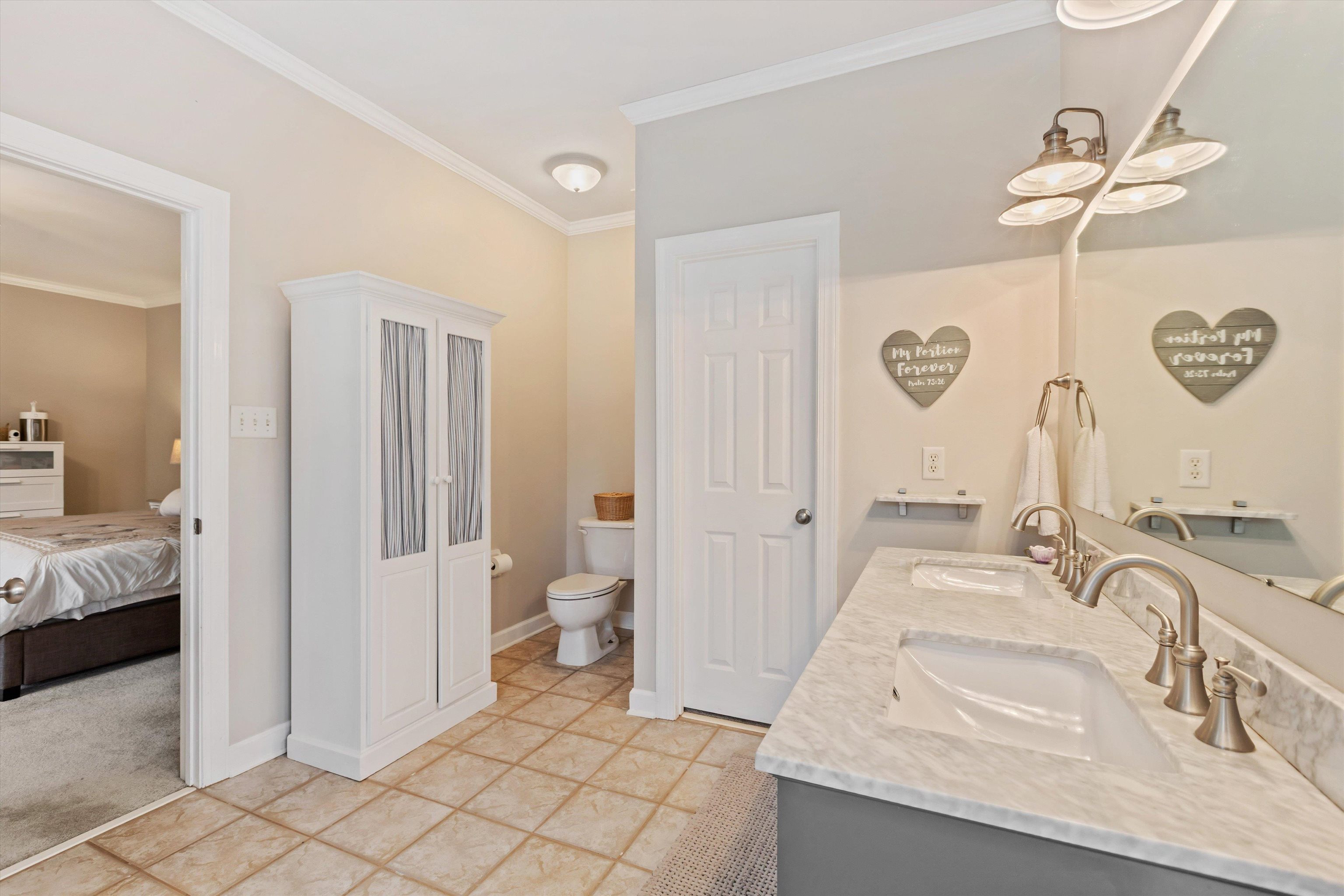 2789 North Collierville Arlington Road Eads, TN 38028 - Photo 17 of 34 a spacious bathroom with a sink and a mirror