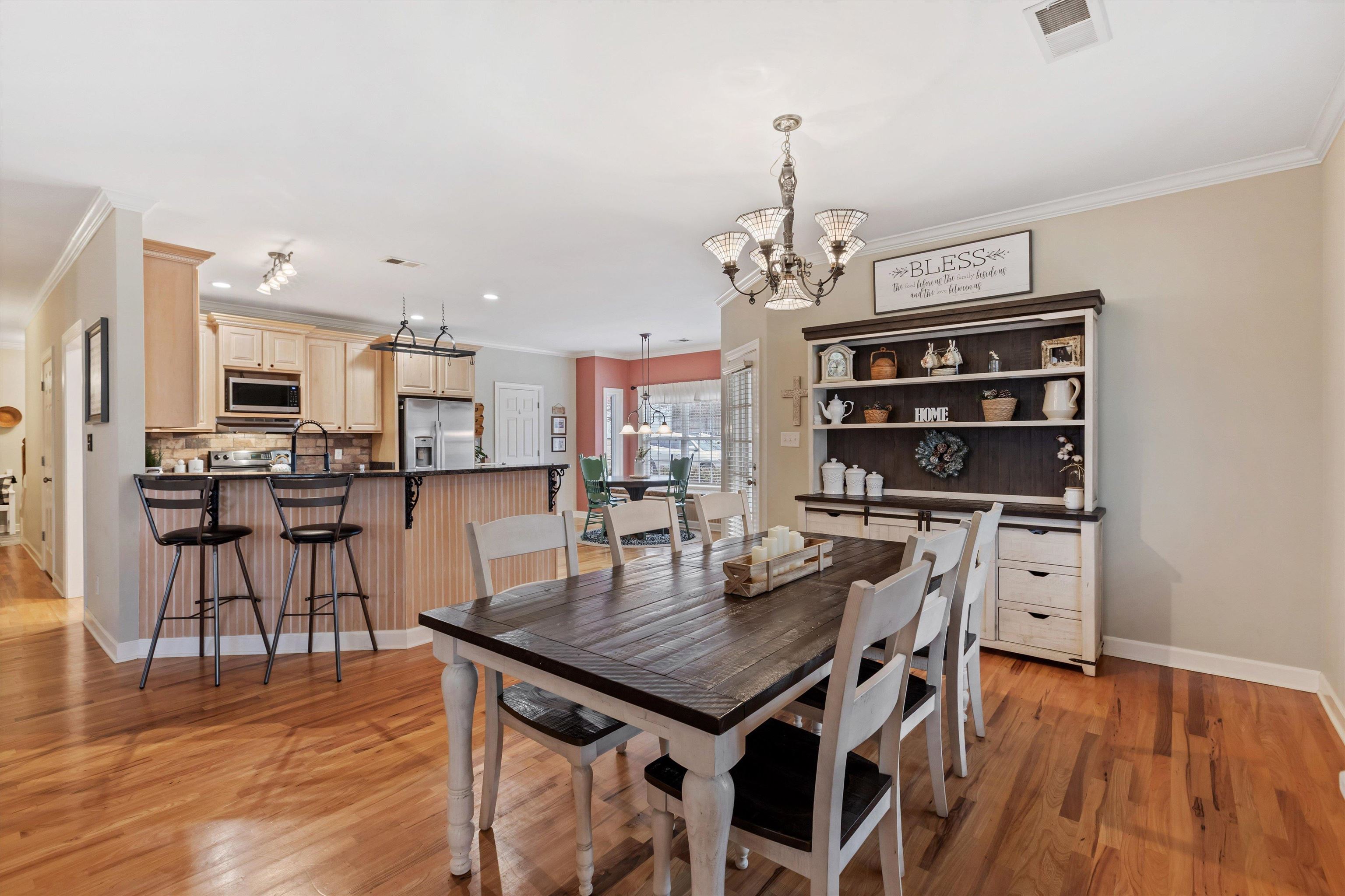 2789 North Collierville Arlington Road Eads, TN 38028 - Photo 10 of 34 a view of a dining room with furniture and wooden floor